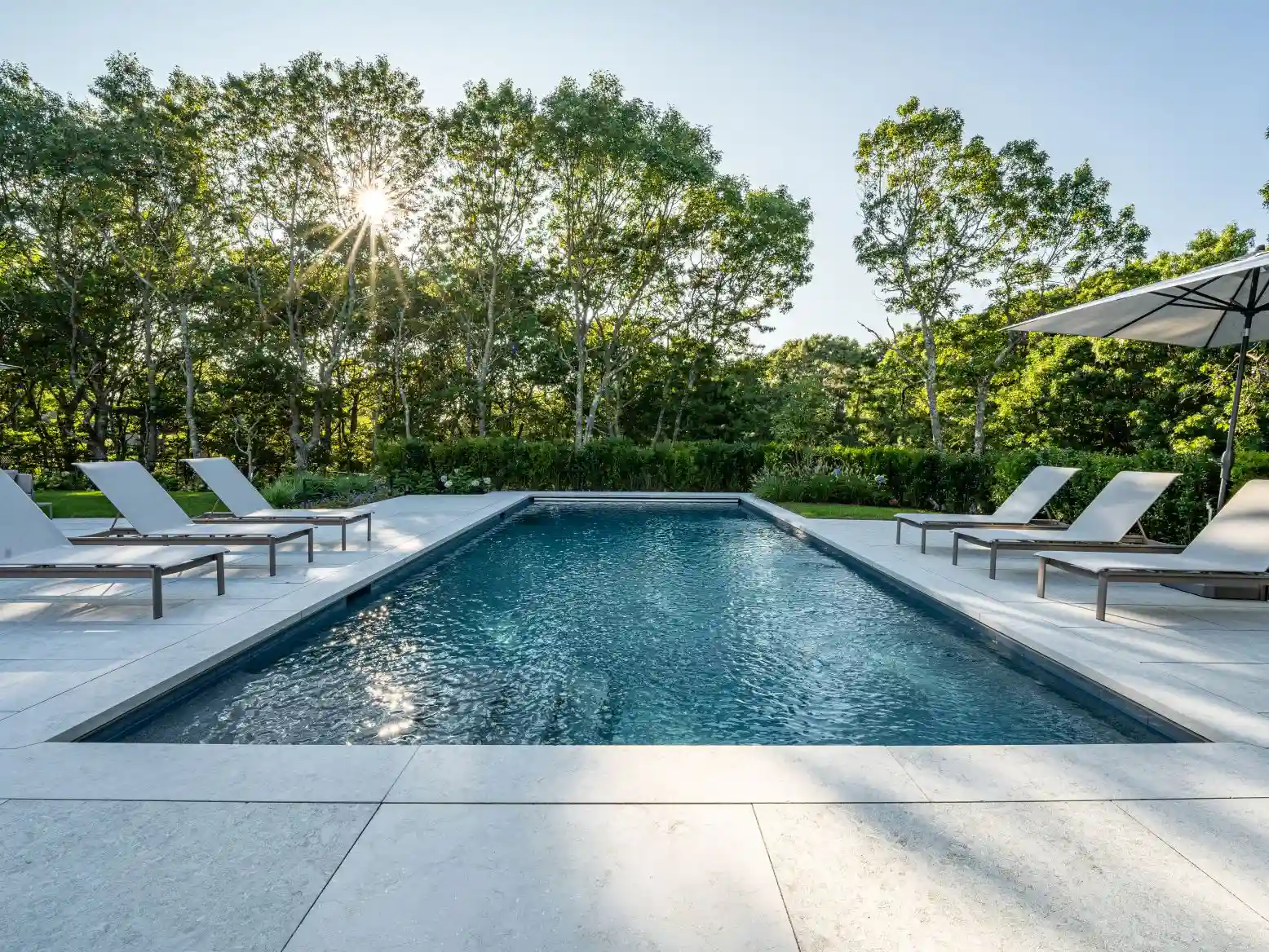 Finished outdoor living space with warm golden hour lighting
